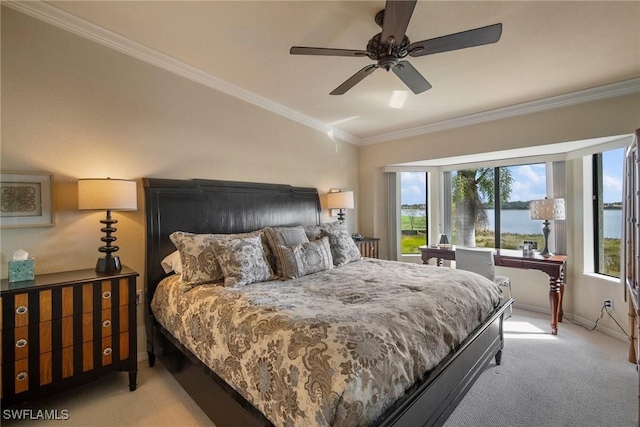 bedroom featuring ornamental molding, light carpet, and ceiling fan