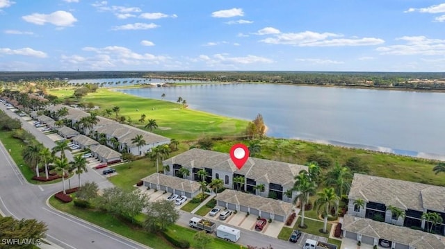 drone / aerial view featuring a water view