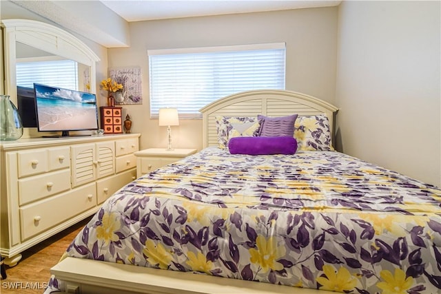 bedroom featuring hardwood / wood-style flooring