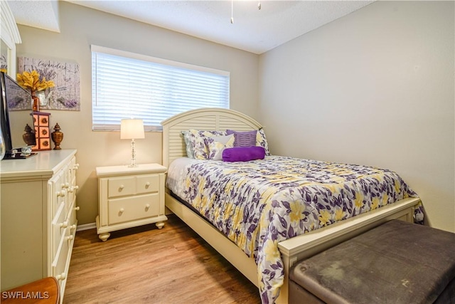 bedroom featuring light hardwood / wood-style floors