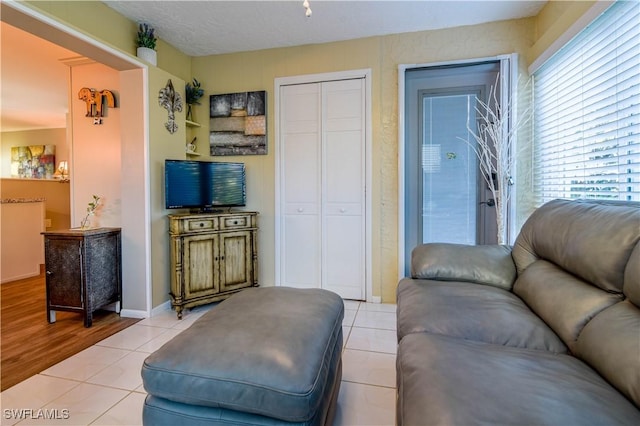 living room featuring light tile patterned floors