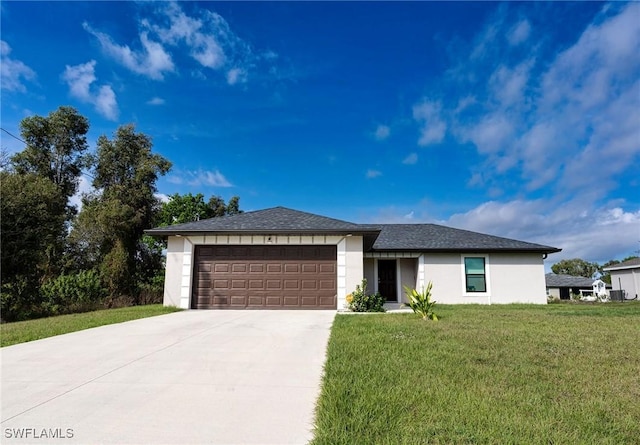 320 Ranch Ave, Lehigh Acres, FL 33974 - prairie-style house with an attached garage, driveway, a front lawn, and stucco siding