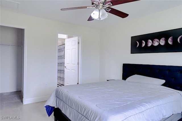 320 Ranch Ave, Lehigh Acres, FL 33974 - tiled bedroom featuring a closet, baseboards, a ceiling fan, and connected bathroom