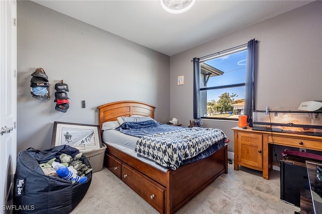 bedroom with light carpet