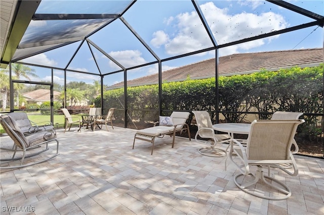 view of patio / terrace with glass enclosure