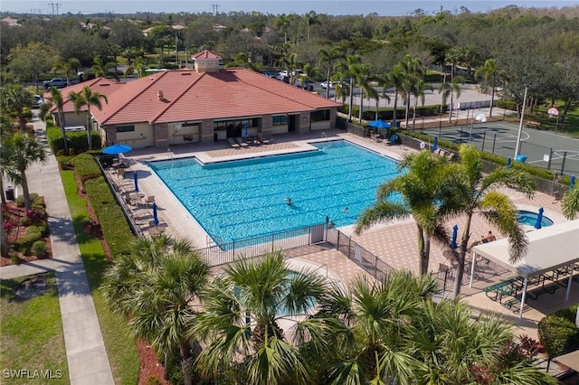 view of swimming pool with a patio