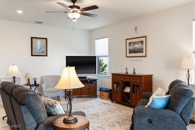 living room featuring ceiling fan