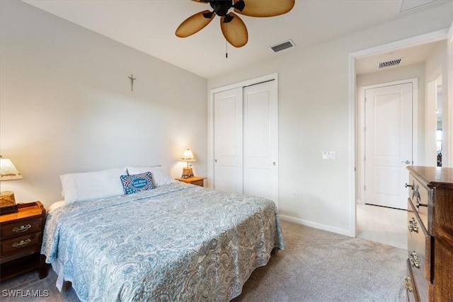 bedroom featuring carpet floors, ceiling fan, and a closet