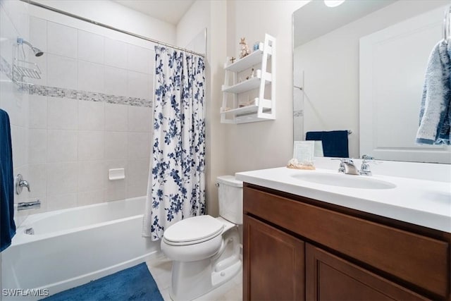 full bathroom with vanity, toilet, and shower / tub combo