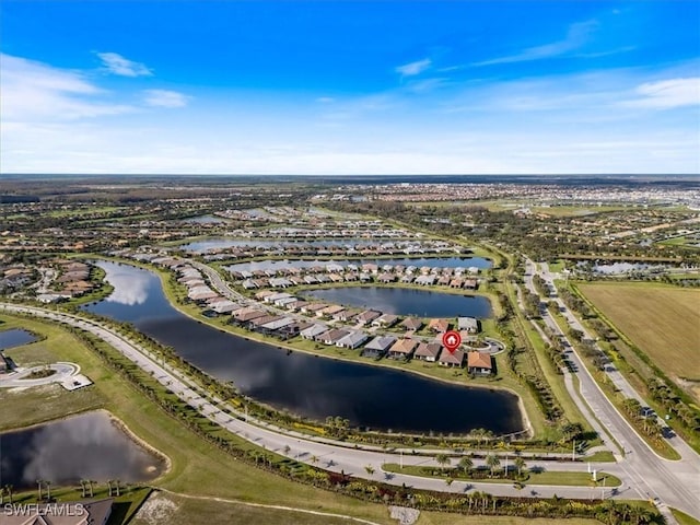 bird's eye view with a water view