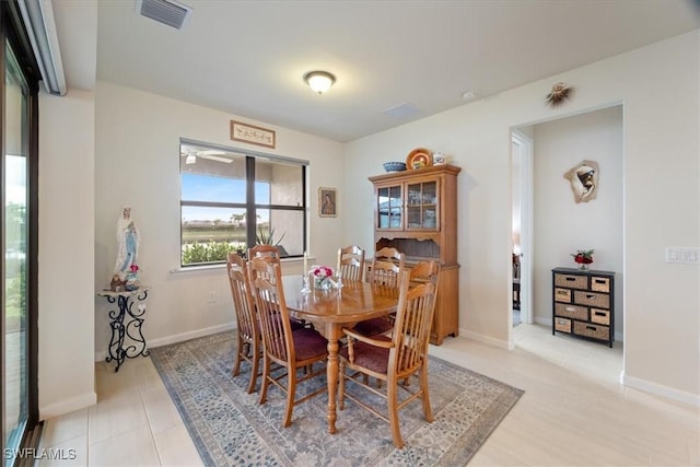 view of tiled dining space