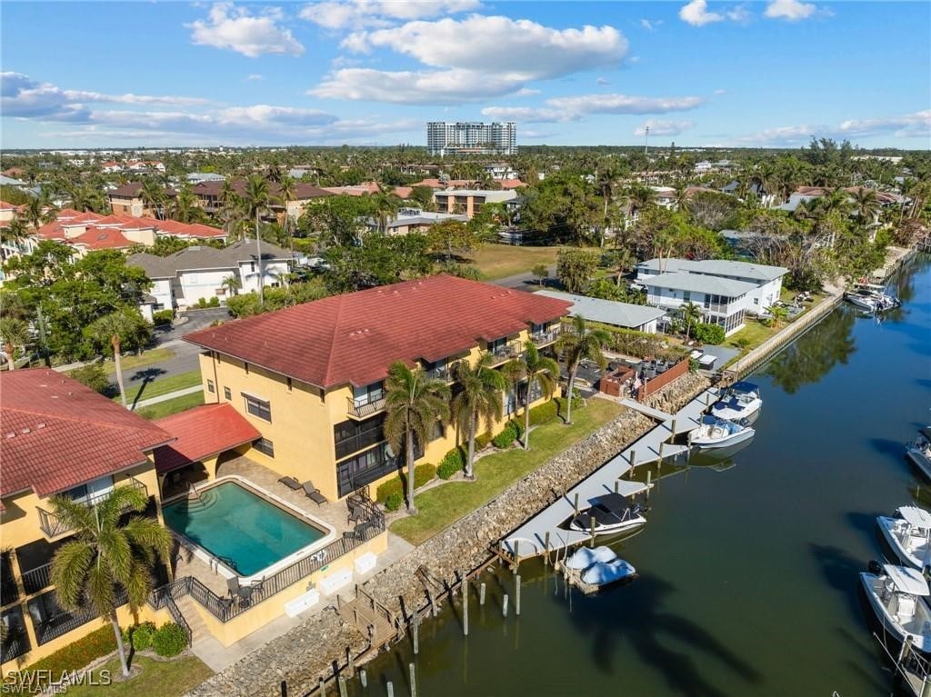 drone / aerial view featuring a water view