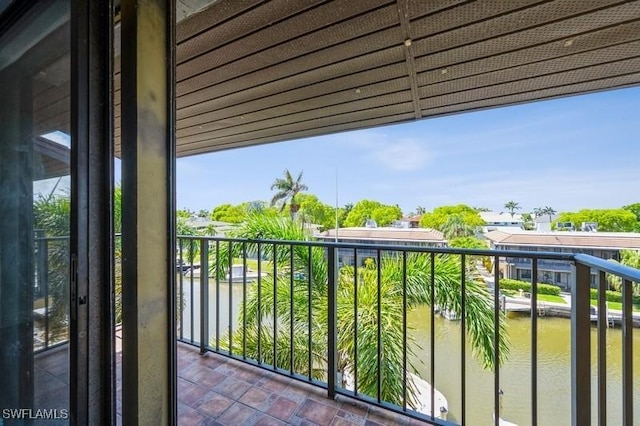 1400 Blue Point Ave Unit 207, Naples, FL 34102 - balcony featuring a water view