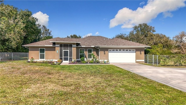 view of front facade featuring a garage and a front lawn