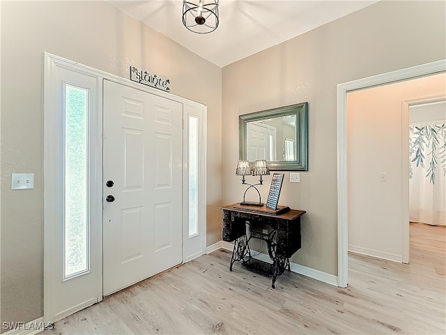 foyer with light hardwood / wood-style flooring