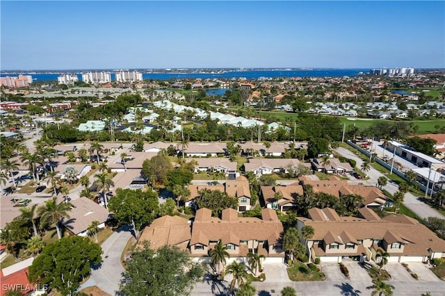 aerial view with a water view and a residential view