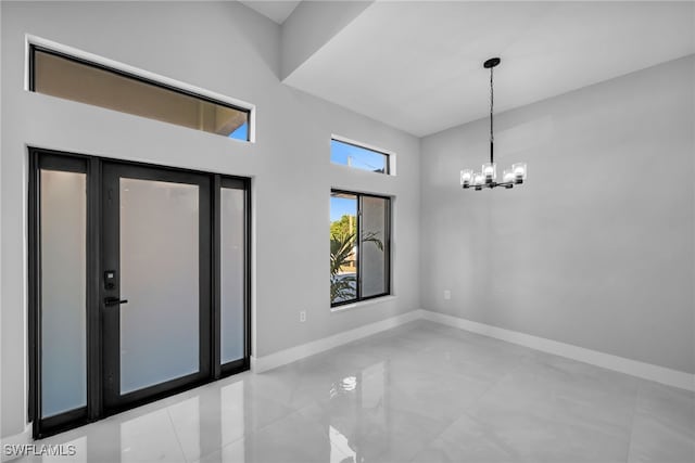 interior space with an inviting chandelier