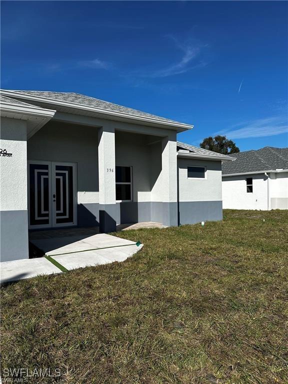 exterior space with a lawn