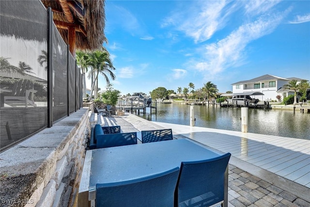 view of dock with a water view