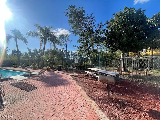 view of pool featuring a patio