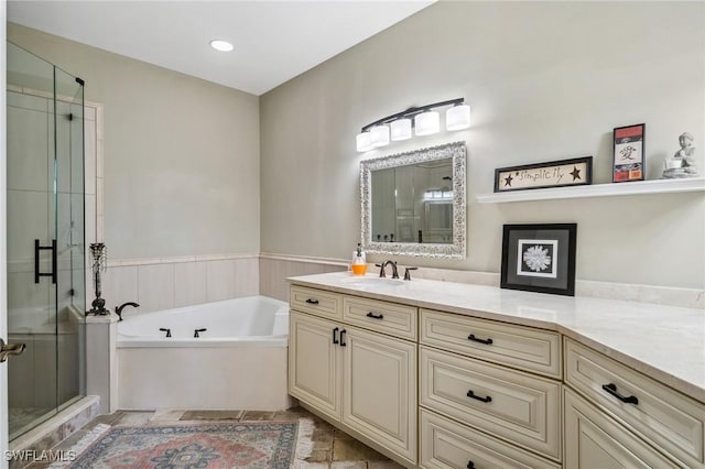 bathroom with vanity and plus walk in shower