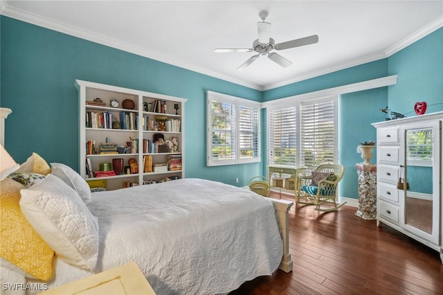 bedroom featuring ornamental molding, ceiling fan, and dark hardwood / wood-style flooring