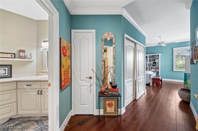 corridor featuring crown molding and dark hardwood / wood-style floors