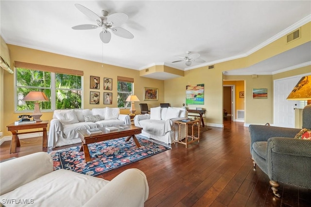 living room with dark hardwood / wood-style flooring, ornamental molding, and ceiling fan