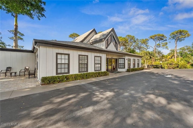 view of property exterior featuring a patio