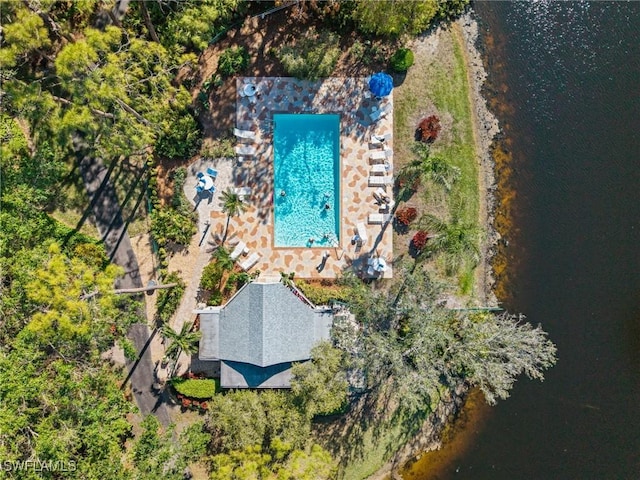 birds eye view of property featuring a water view