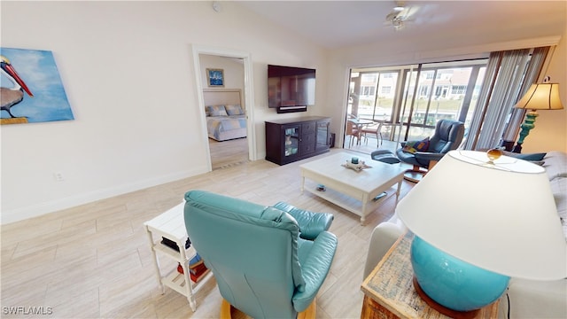 living room with vaulted ceiling