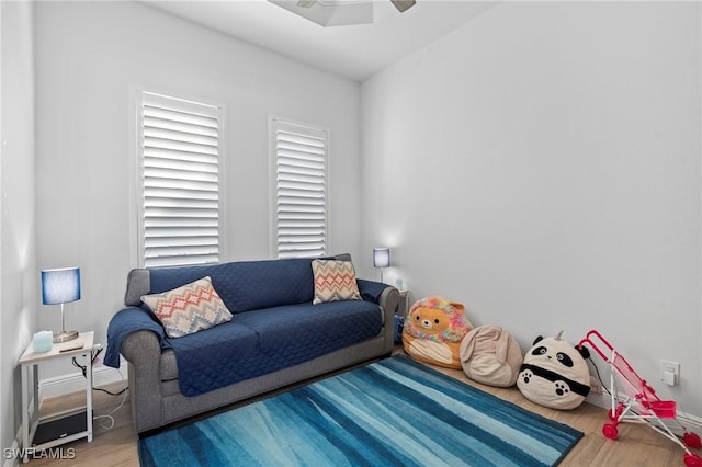 interior space featuring hardwood / wood-style floors and ceiling fan