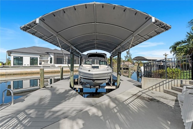 view of dock with a water view