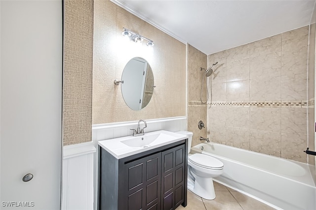 full bathroom with vanity, tile patterned flooring, tiled shower / bath combo, and toilet