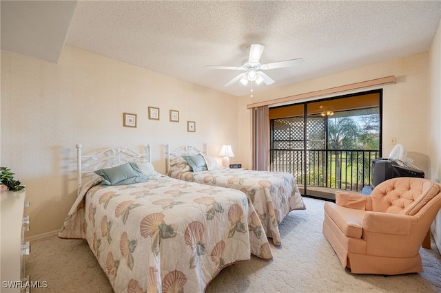 bedroom with ceiling fan, light colored carpet, a textured ceiling, and access to outside