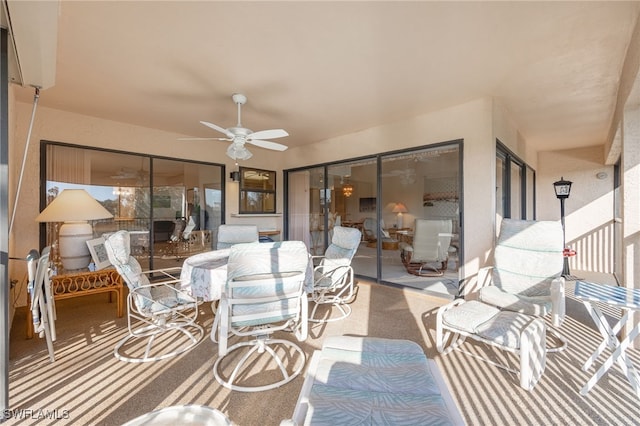 view of patio / terrace featuring ceiling fan