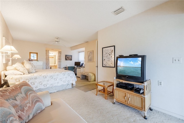 bedroom featuring ceiling fan and light colored carpet