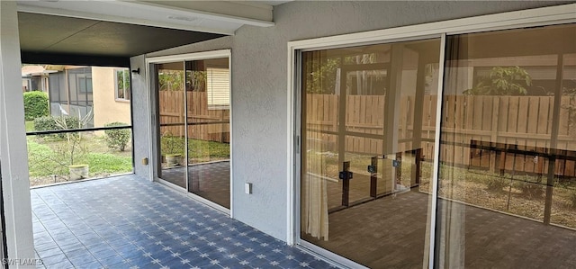 doorway with lofted ceiling