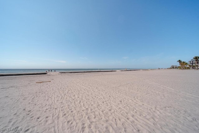 view of water feature featuring a beach view