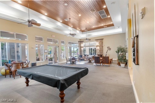 recreation room with light colored carpet, pool table, visible vents, wood ceiling, and a raised ceiling