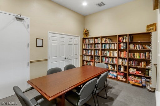 carpeted office featuring visible vents