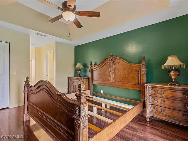 bedroom featuring wood-type flooring and ceiling fan