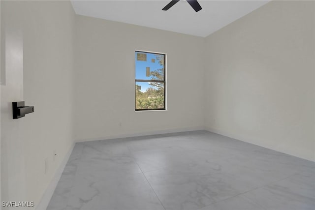 unfurnished room featuring ceiling fan