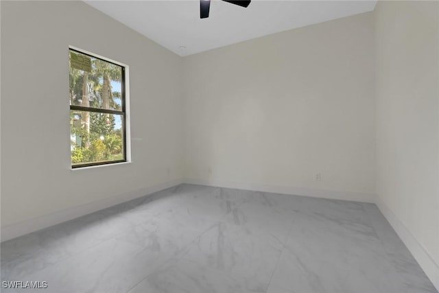 unfurnished room featuring ceiling fan