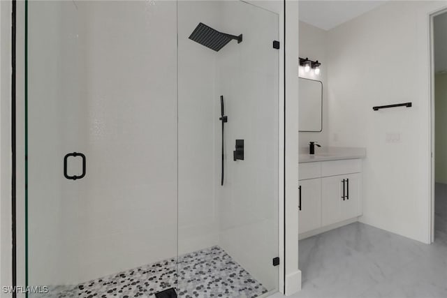 bathroom with vanity and an enclosed shower