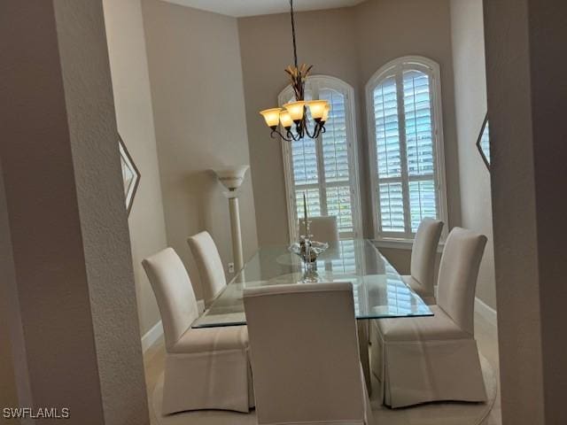 dining room featuring a chandelier