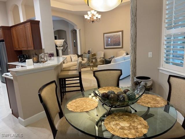 dining area with a chandelier