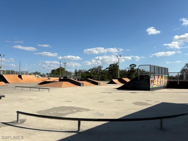 surrounding community featuring fence