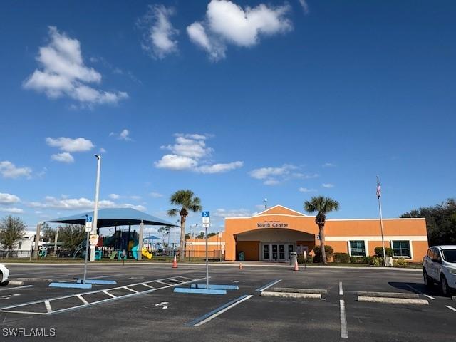 view of uncovered parking lot