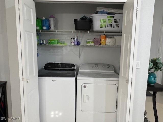 laundry area featuring laundry area and washer and clothes dryer